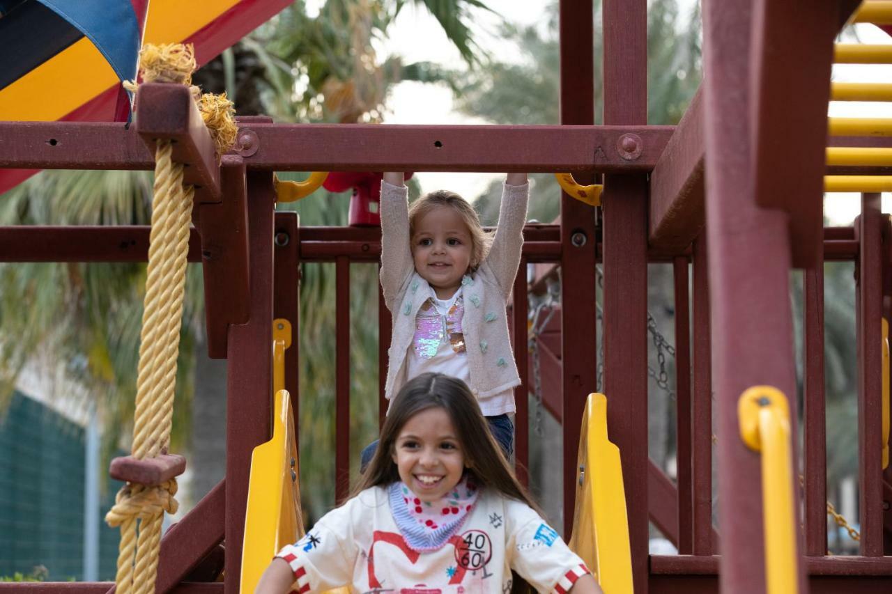 Jumeirah Messilah Beach Kuwait Kuwait City Exterior foto Children playing at the park